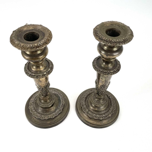 314 - An Old Sheffield Plate three-sconce candelabrum. Height 57cm. Together with a pair of similar candle... 