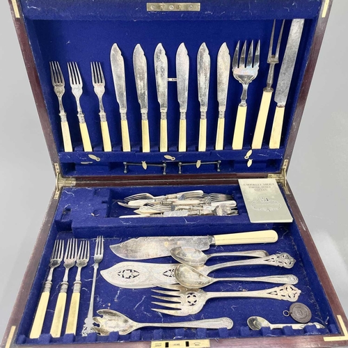 315 - A 20th century part canteen of cutlery in a two drawer mahogany case. Height 24cm width 47cm depth 3... 