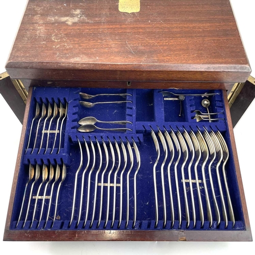 315 - A 20th century part canteen of cutlery in a two drawer mahogany case. Height 24cm width 47cm depth 3... 