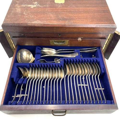 315 - A 20th century part canteen of cutlery in a two drawer mahogany case. Height 24cm width 47cm depth 3... 