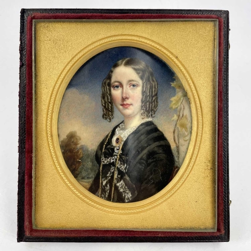 316 - English school, circa 1860 portrait miniature of a lady. With ringlets, a lace collar and wearing a ... 