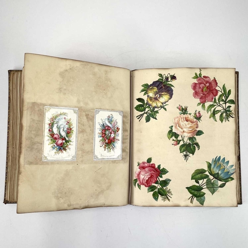 334 - A Victorian scrap album bound in embossed leather. .