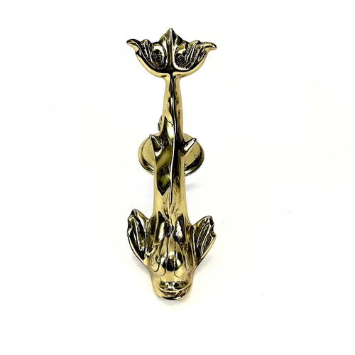 34 - A Victorian brass dolphin door knocker. Height 23cm, with turned stud.