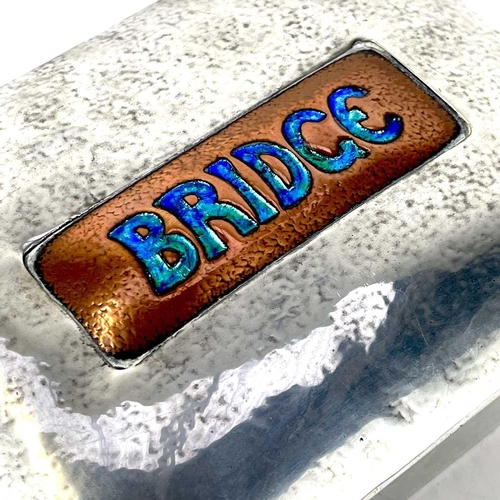 402 - A Liberty & Co Tudric pewter and copper enamel Bridge box. Stamped, 0414 English Pewter Liberty & Co... 