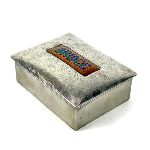 402 - A Liberty & Co Tudric pewter and copper enamel Bridge box. Stamped, 0414 English Pewter Liberty & Co... 