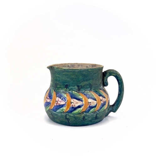 406 - Ella Napper, Lamorna, A painted pottery jug. Initialled and inscribed to the base, height 9cm.