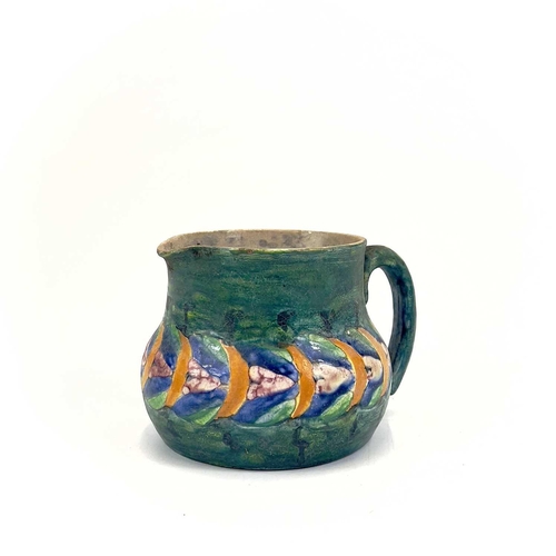 406 - Ella Napper, Lamorna, A painted pottery jug. Initialled and inscribed to the base, height 9cm.