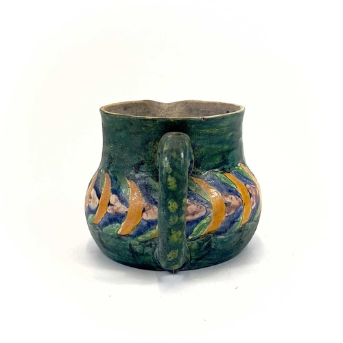 406 - Ella Napper, Lamorna, A painted pottery jug. Initialled and inscribed to the base, height 9cm.