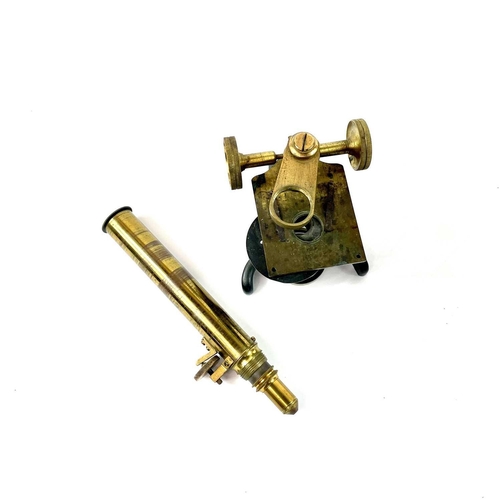 41 - A late Victorian brass microscope. Contained in a mahogany box, height 24cm.