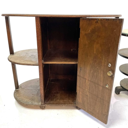 411 - An Art Deco green stained oak mirror top cocktail table. With applied fret cut plaques and two hinge... 