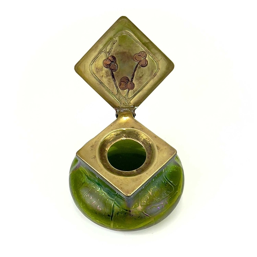 414 - A Loetz type iridescent glass inkwell. Possibly Kralik, the lozenge shape brass cover with copper hi... 