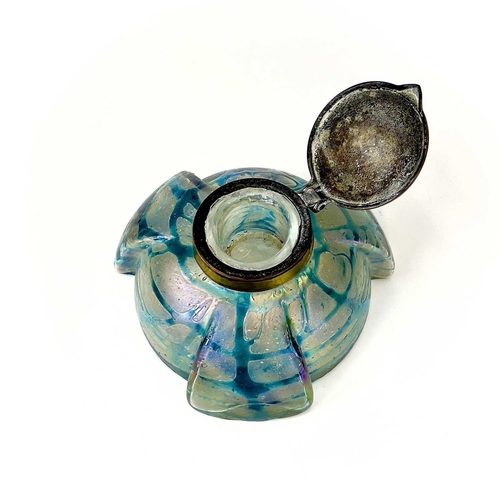 417 - A Kralik iridescent glass inkwell. The lobed circular body with green trailed decoration and embosse... 