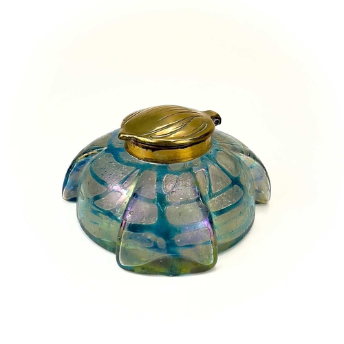 417 - A Kralik iridescent glass inkwell. The lobed circular body with green trailed decoration and embosse... 