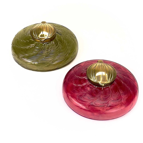 418 - A circular ruby glass inkwell, probably Kralik. With a web of trailed decoration and embossed brass ... 