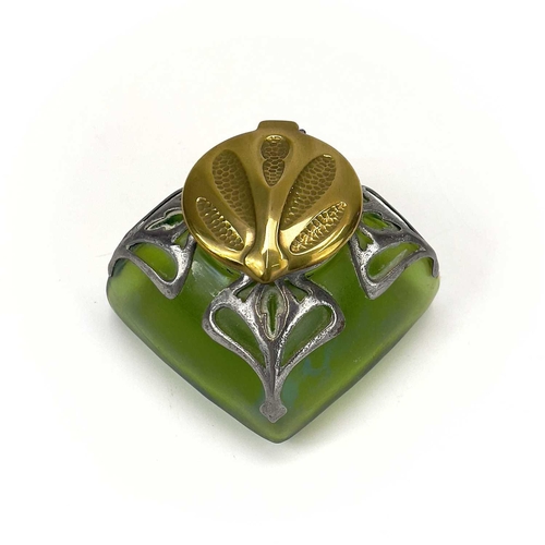 420 - An Art Nouveau iridescent green glass inkwell. Of square section, with embossed brass cover and pier... 