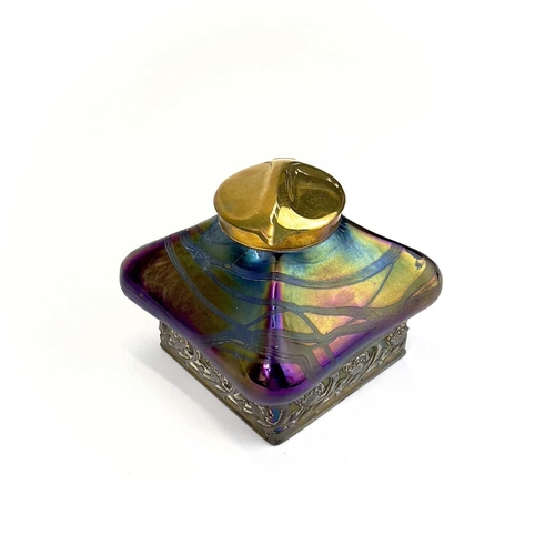 424 - An iridescent glass inkwell, probably Loetz. Of lobed square form with typical trailed decoration an... 