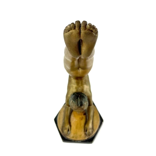 453 - An Art Deco bronze painted plaster figure of a female acrobat. Stamped O P 406 RD825881, height 45cm... 