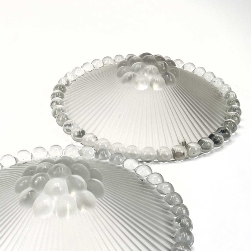 455 - A pair of Lalique ceiling light shades. Signed R Lalique France, diameter 29cm.