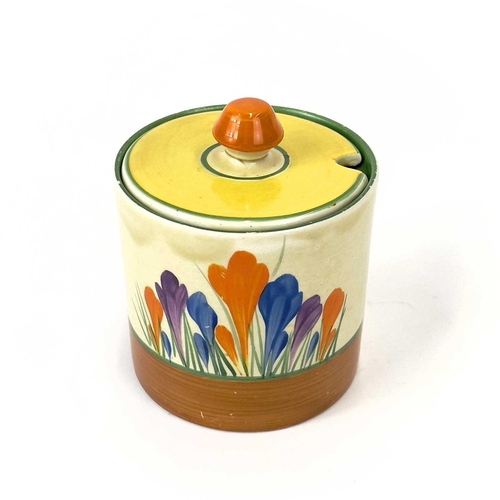 459 - A collection of Clarice Cliff 'Crocus' pattern ceramics. Comprising of a jug, bowl, preserve pot wit... 