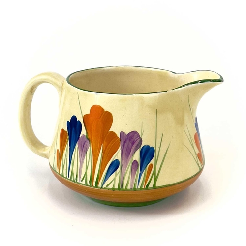 459 - A collection of Clarice Cliff 'Crocus' pattern ceramics. Comprising of a jug, bowl, preserve pot wit... 