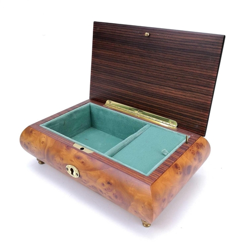 47 - A Swiss Reuge Romance musical jewellery box. Playing Edelweiss, contained in an Italian burr maple a... 