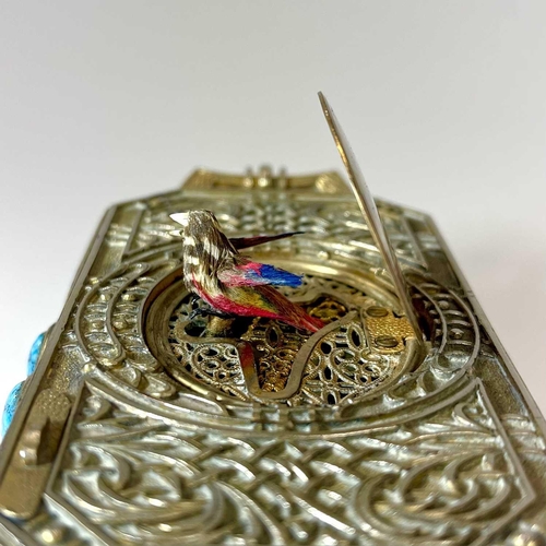 50 - A 20th century German gilt metal bird automaton music box. Decorated with scrolling tendrils and lat... 