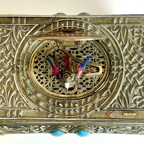 50 - A 20th century German gilt metal bird automaton music box. Decorated with scrolling tendrils and lat... 