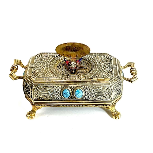 50 - A 20th century German gilt metal bird automaton music box. Decorated with scrolling tendrils and lat... 