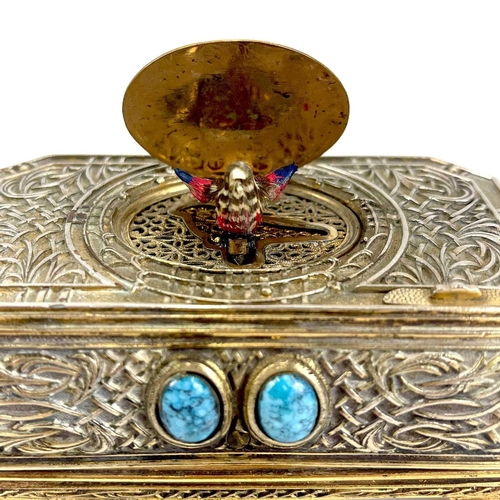 50 - A 20th century German gilt metal bird automaton music box. Decorated with scrolling tendrils and lat... 