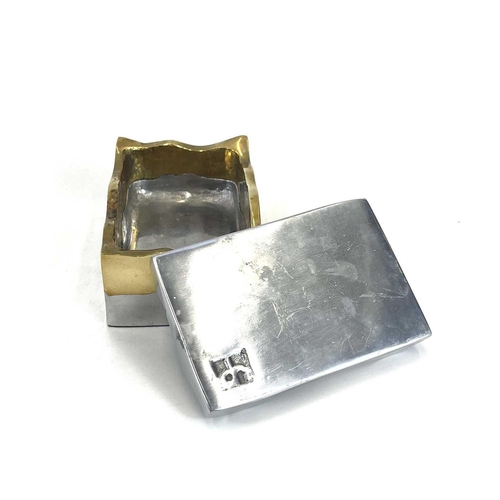 502 - A David Marshall (b.1942) aluminum and brass 'Brutalist' jewellery box. Height 5cm, width 11.5cm, de... 