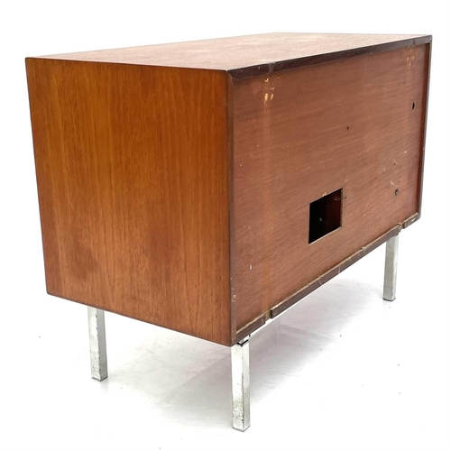 509 - A mid-century teak side cabinet. Fitted two sliding doors and raised on square metal legs. Height 68... 