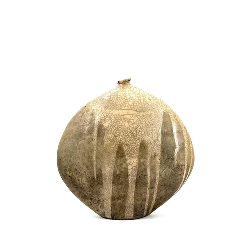 510 - Christa Maria HERRMANN (b.1945). A large Raku fired vase of flattened ovoid form, potter's label to ... 