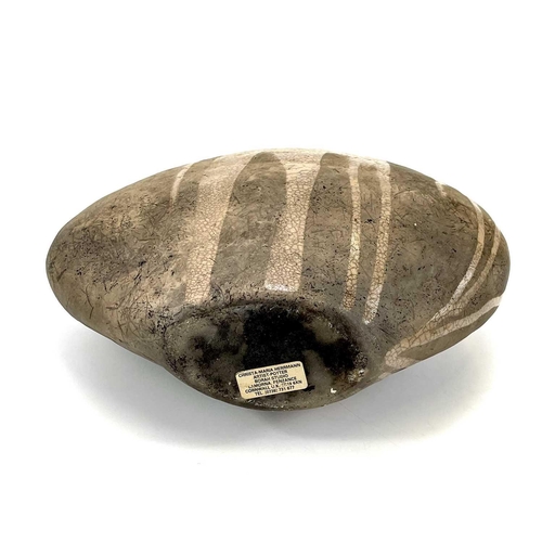 510 - Christa Maria HERRMANN (b.1945). A large Raku fired vase of flattened ovoid form, potter's label to ... 