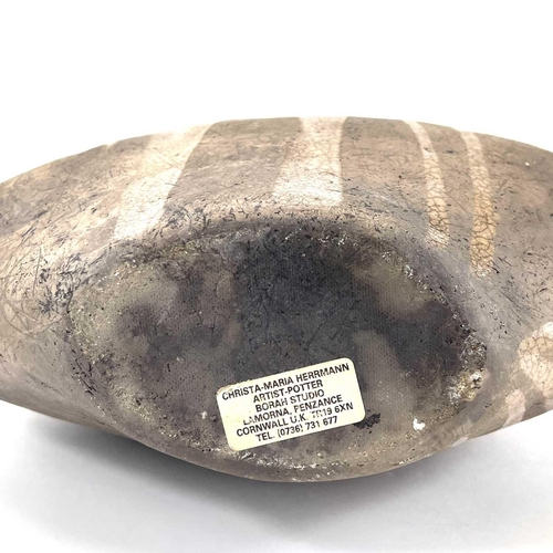 510 - Christa Maria HERRMANN (b.1945). A large Raku fired vase of flattened ovoid form, potter's label to ... 