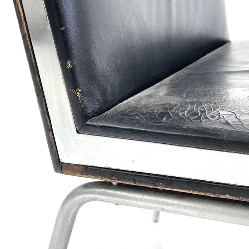 517 - After Hans J Wegner, a mid-century chrome-edged leather chair. Raised on a tubular metal frame. Heig... 