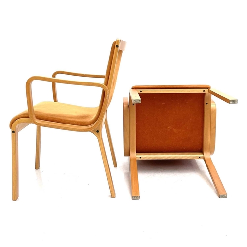 518 - Karl Erik Ekselius for JOC Design. A pair of laminated bentwood beech open armchairs with orange pad... 