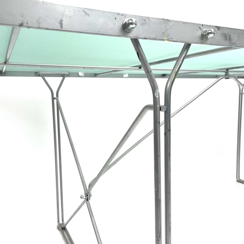 520 - Niels Gammelgaard for Ikea a glass topped Moment dining table. Raised on a coated steel frame, heigh... 