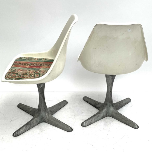 521 - An Arkana white laminate Tulip table and four chairs. 1960s, the chairs on aluminium supports, the o... 