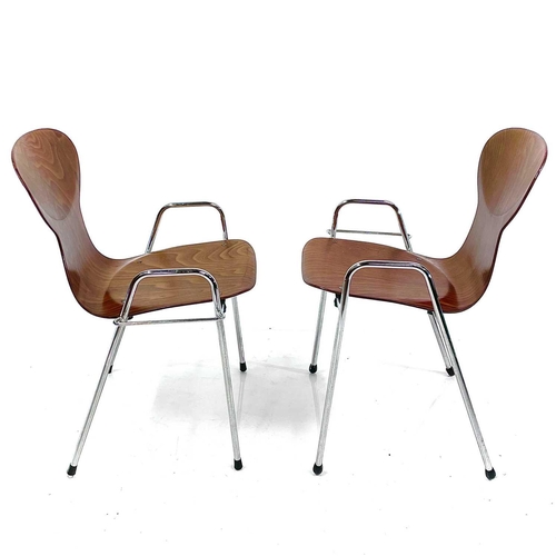 522 - A pair of Tubax chrome and bentwood stackable chairs. Dated 1980 and stamped mark OCF-CBB 5/744-797,... 