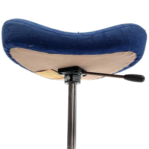 534 - A Norwegian Stokke ergonomic balance stool. Raised on a circular laminated beech base, height 71cm.