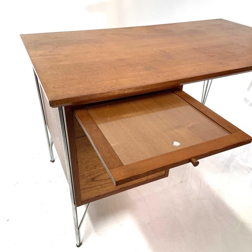 535 - A Danish teak and chrome 'Hairpin' desk. 1970s, fitted with two drawers and a glass topped slide, he... 