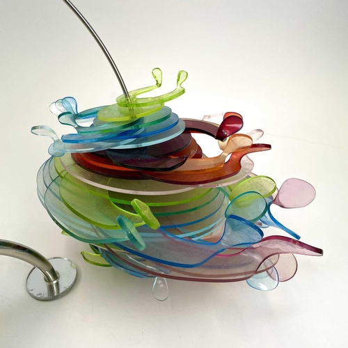 550 - Sculpture Coloured acrylic/perspex segments together with another similar.