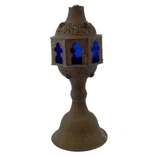 56 - A tall pierced Indian brass hookah. 20th century, with blue glass panels and three pipes, height 193... 