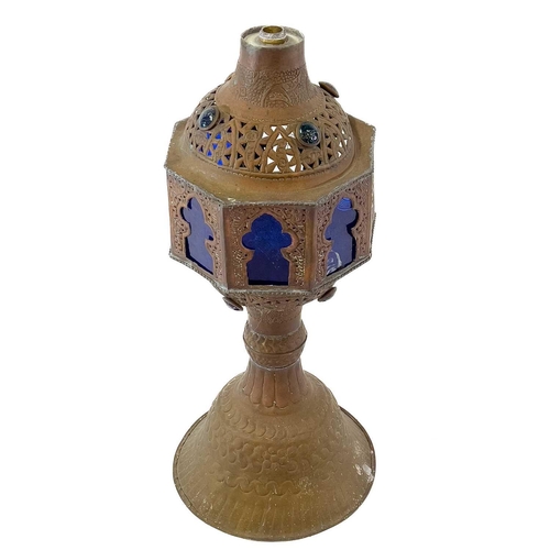 56 - A tall pierced Indian brass hookah. 20th century, with blue glass panels and three pipes, height 193... 