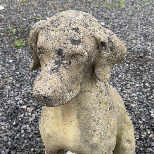 600 - A pair of reconstituted stone figures of Pointer type dogs. Height 73cm.