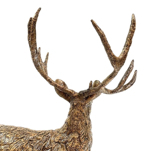 602 - A Large resin figure of a stag. Height 149cm.