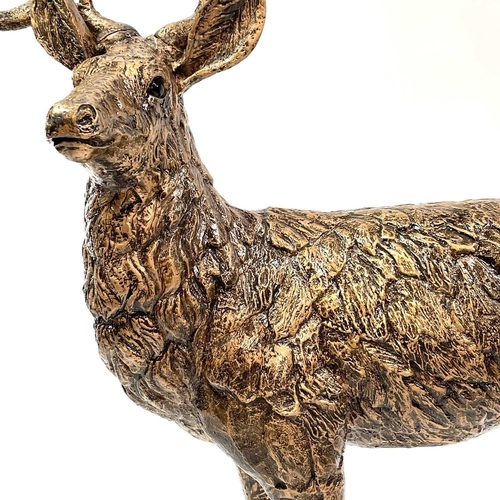 602 - A Large resin figure of a stag. Height 149cm.