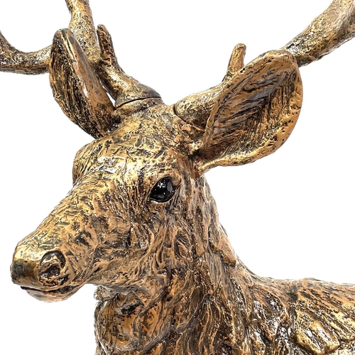 602 - A Large resin figure of a stag. Height 149cm.