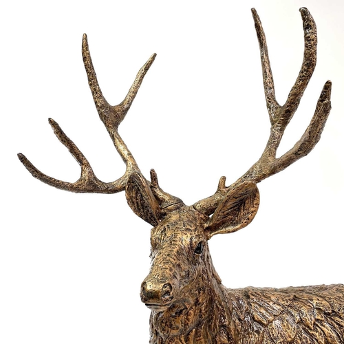 602 - A Large resin figure of a stag. Height 149cm.