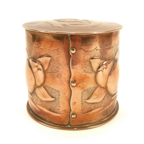 8 - A Newlyn copper cylindrical tea caddy and cover. Repousse decorated with a band of medlars on a punc... 